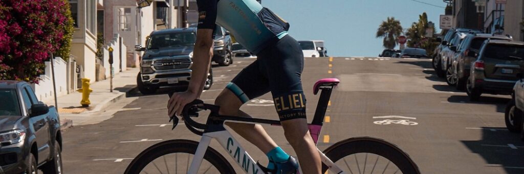 Road cycle with The Vseat installed, crossing road